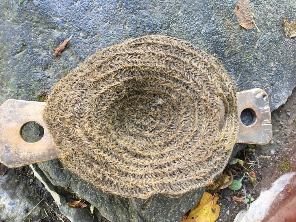 Silhår, en sil laget av hestetagl i nålebindingsteknikk. Gammel gjenstand som er i Telemark museums samlinger